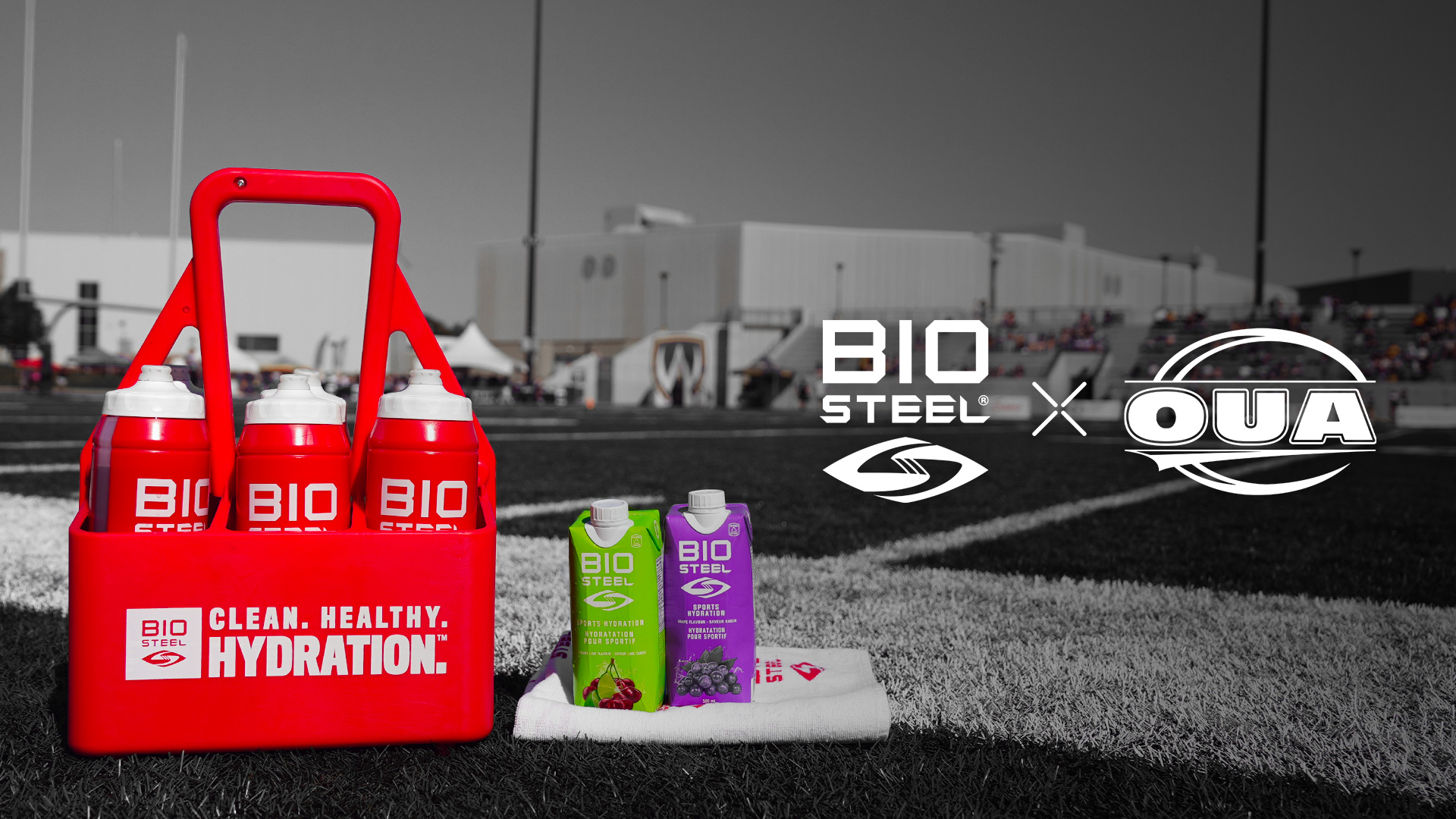 Black and white background of a football field, with BioSteel products featured in colour on the sidelines, along with the BioSteel and OUA logos, respectively