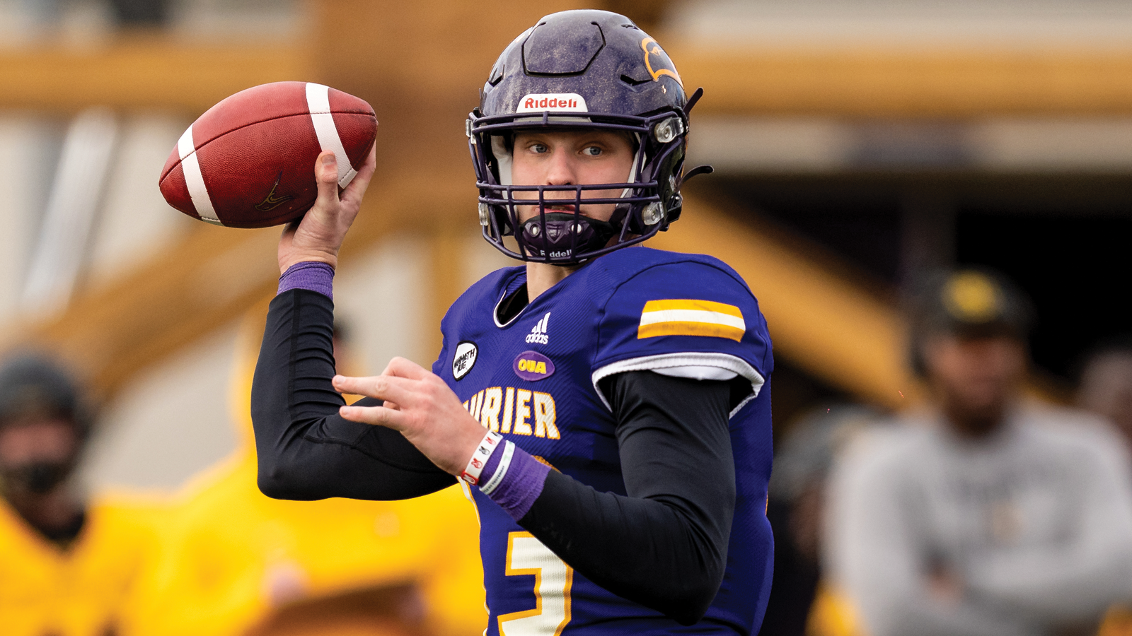 Laurier football quarterback Taylor Elgersma throwing the ball during a game