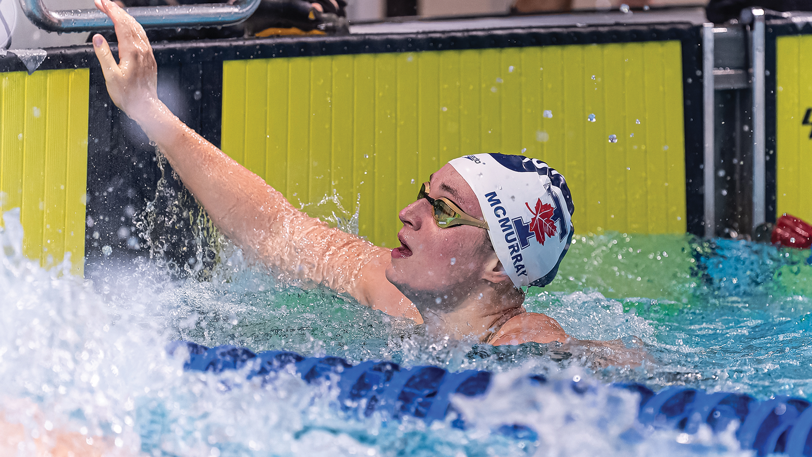 Action photo of Toronto Varsity Blues swimmer Ainsley McMurray 