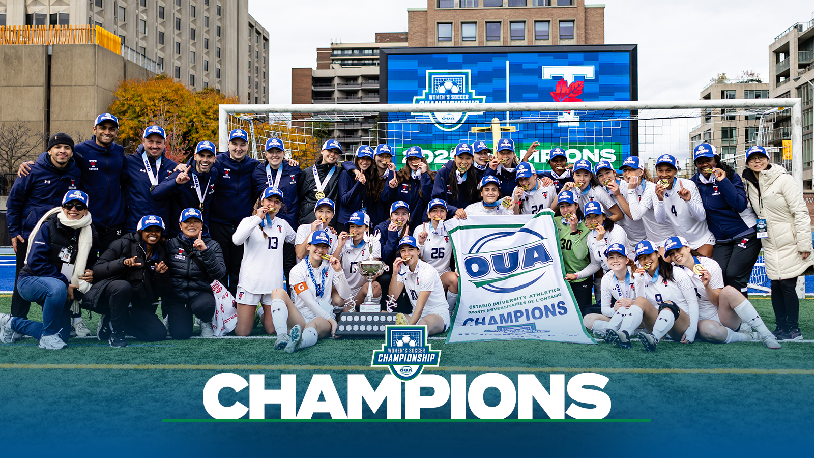 Banner photo of the Toronto Varsity Blues after winning the OUA Championship with a blue gradient on the bottom and the OUA women's soccer Championship logo and the Toronto Varsity Blues logo on the bottom and the word Champion in large white letters.